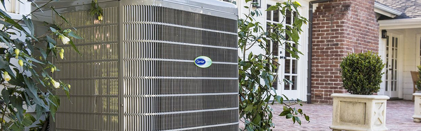 Carrier HVAC system in backyard